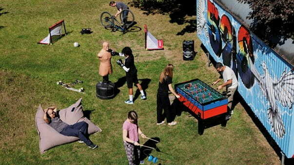 A group of people exercising outdoors.